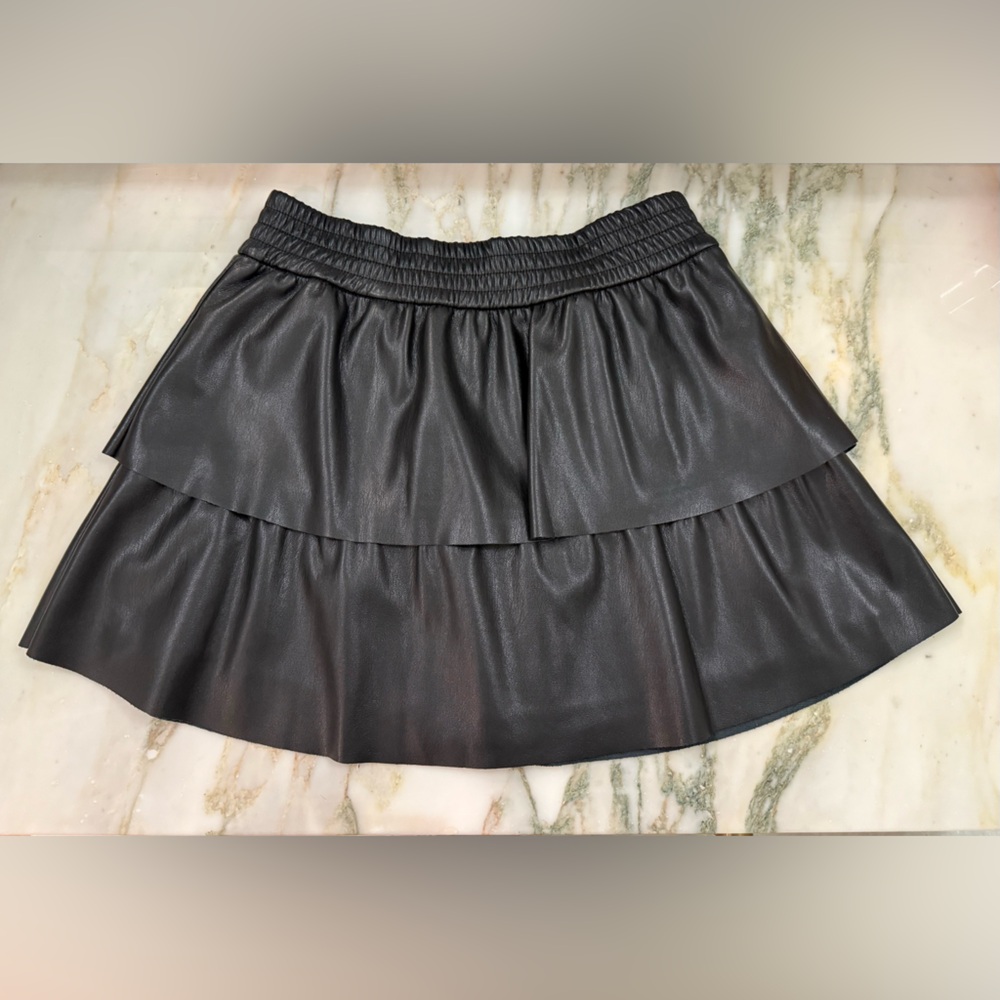 Alice and Olivia vegan leather tiered mini skirt 
Color black, size 4